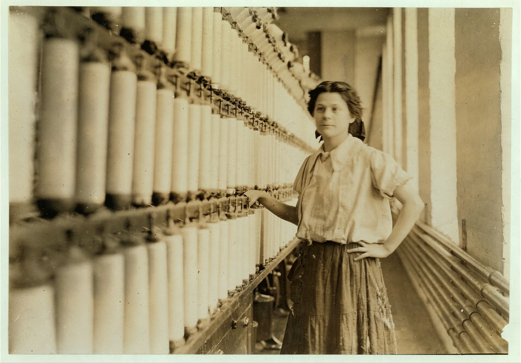 Anna Grenier at her “speeder” in the Chace Cotton Mill, Burlington, May 7, 1909. Photograph by Lewis W. Hine, Library of Congress, https://www.loc.gov/item/2018675128/.