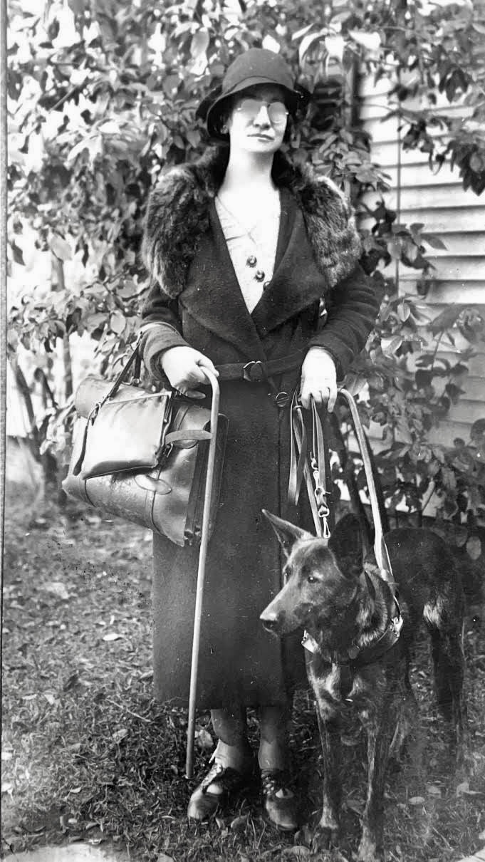 Anne Connelly, 1931, the Blind Merchant of Burlington, is reported to be the first person to use a seeing eye dog in the state. Courtesy John Thomas.